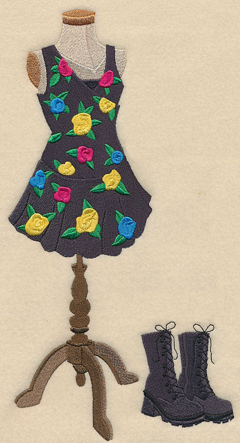 Embroidered dress with floral patterns on a mannequin and matching Doc Marten boots. Made in Dunedin, New Zealand by Not Your Nana