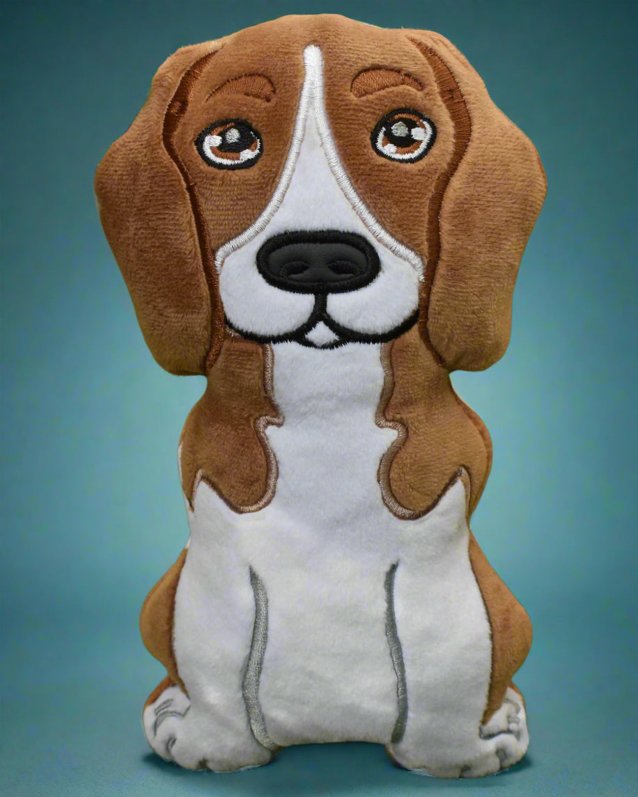 This is a tan and white Beagle soft toy.Made by Not Your Nana in Dunedin, New Zealand.