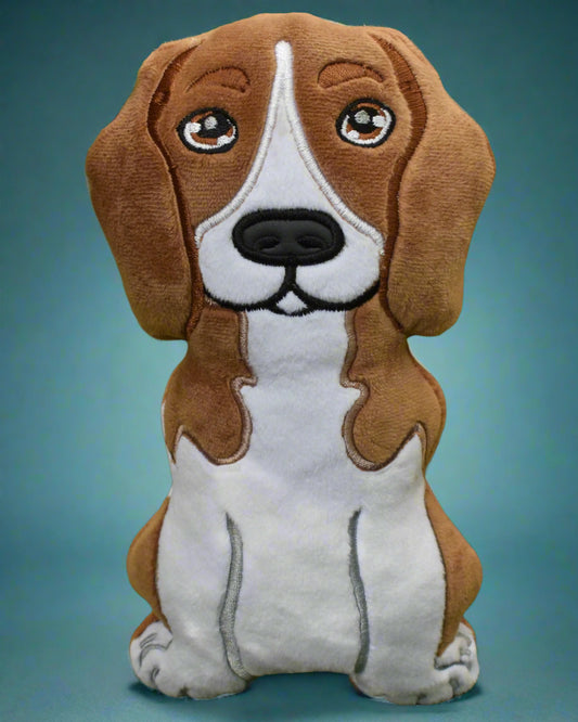 This is a tan and white Beagle soft toy.Made by Not Your Nana in Dunedin, New Zealand.