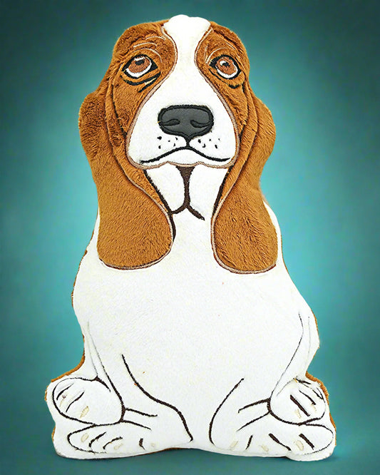 This is a tam and brown Basset hound soft toy with sad eyes and larger ears. Made by ot your Nana in Dunedin, New Zealand.