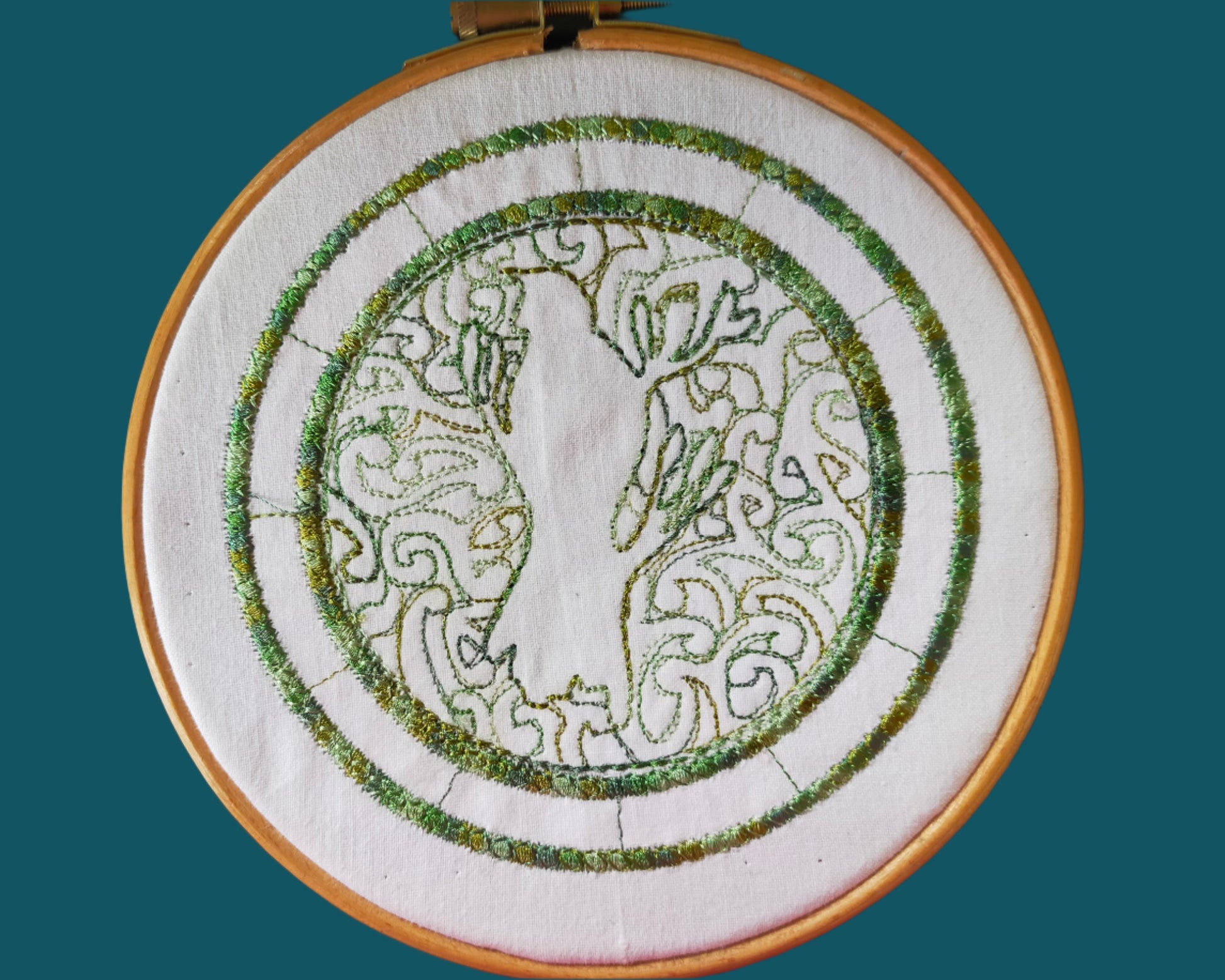 This is a simple line embroidery of a Tui, all in green. Made by Not Your Nana in Dunedin, New Zealand