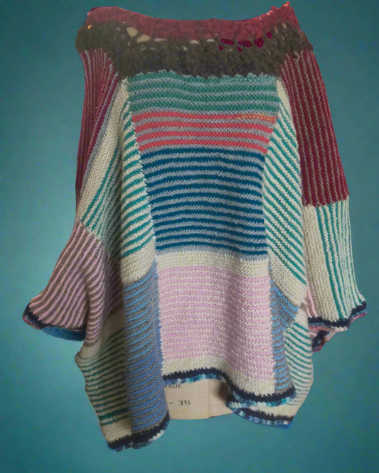 Colorful knitted sweater on a mannequin in a store setting