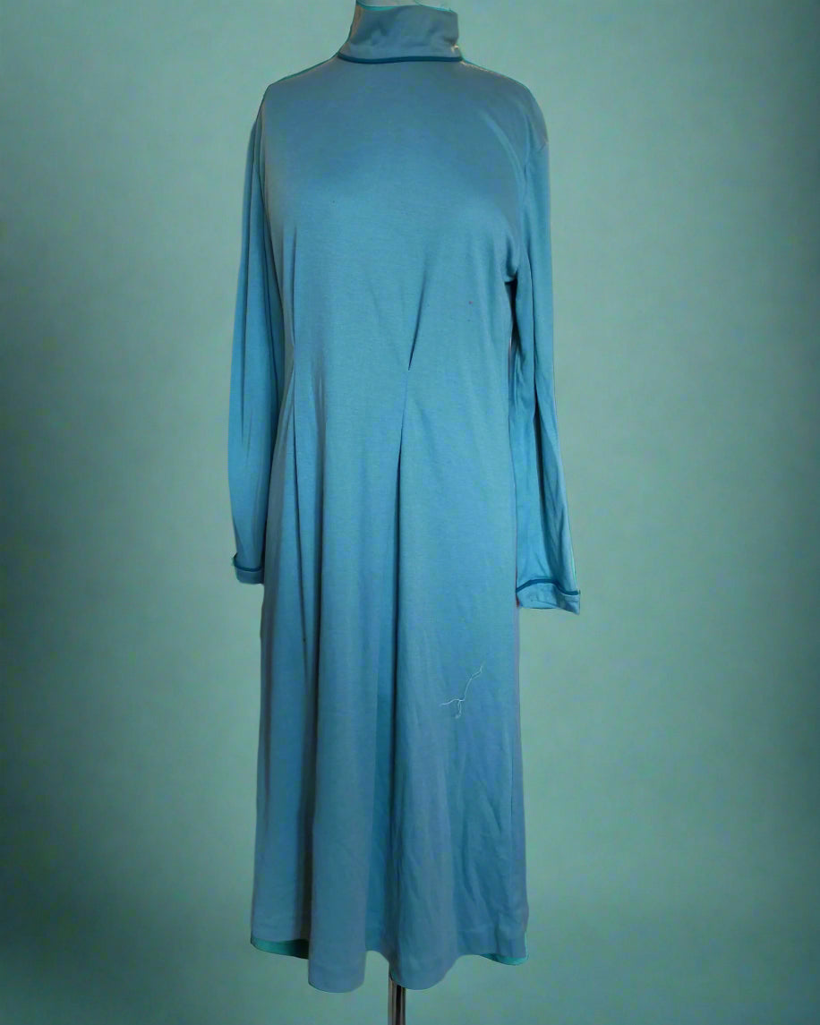 Teal dress on a mannequin