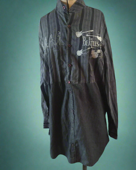 This is a black striped reworked shirt embellished with embroideries of the beatles. Made by nt your nana in Dunedin, New Zealand
