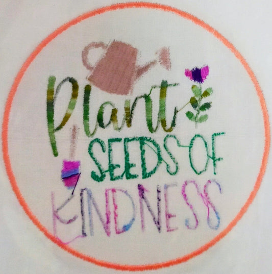 Embroidery design with 'Plant Seeds of Kindness' text and gardening elements on a white background.