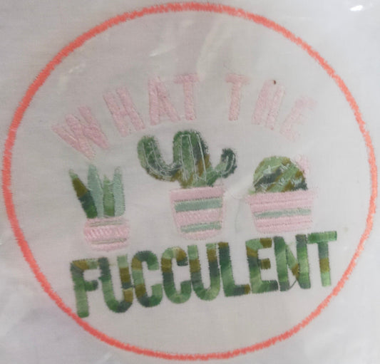 Embroidery design with cacti and text 'WHAT THE Fucculent' on a white background