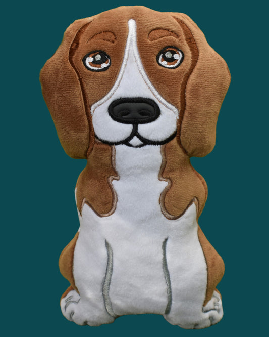 This is a tan and white Beagle soft toy.Made by Not Your Nana in Dunedin, New Zealand.