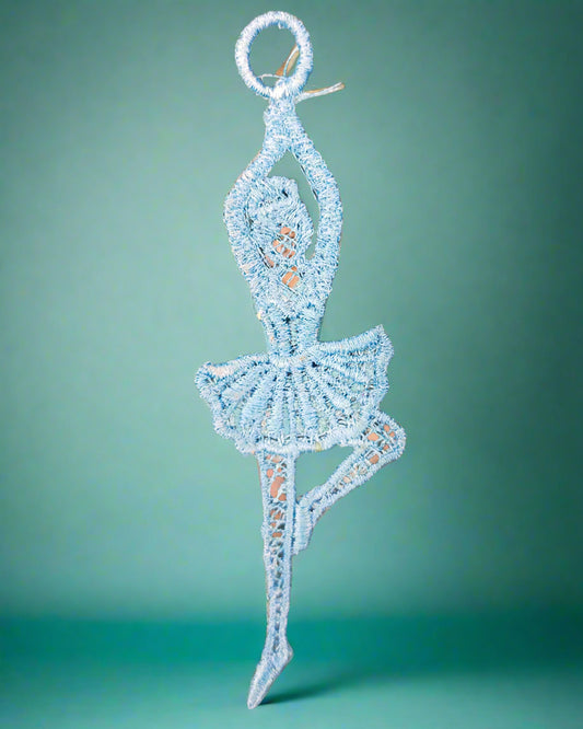 Lace on a textured fabric background ballerina ornament. Made by Not Your Nana, Dunedin, New Zealand