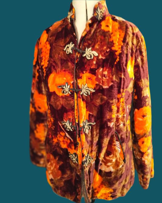 This cotton velvet jacket is brown and orange. It is fully lined in  autumn colours. The non-stretch velvet is thick yet soft. Stylish features are the mandarin collar and pockets. Shipped from Dunedin, New Zealand