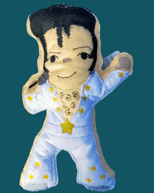 A soft toy for all ages, Elvis Presley is dressed in his iconic white jumpsuit