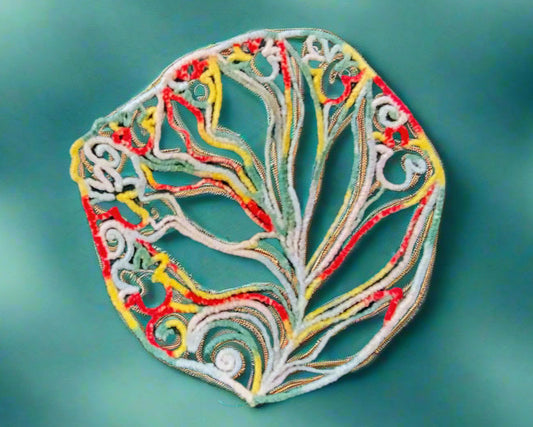 Colourful embroidered tree ornament made by Not Your Nana in Dunedin, New Zealand