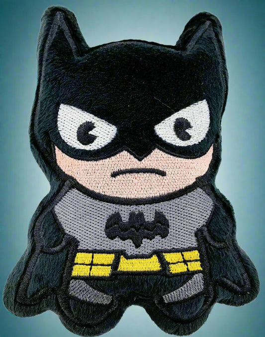 Embroidered patch of a cartoon-like Batman character on a white background