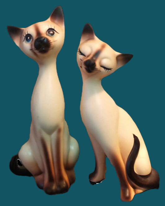 These Siamese cats were made in the 1960s. they are ceramic. They are cream and brown and in good condition with  no chips, cracks or crazing. Shipped from Dunedin, New Zealand