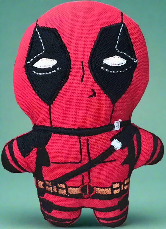 Plush toy resembling  Deadpool with red and black colours. Made by Not Your Nana, Dunedin, New Zealand
