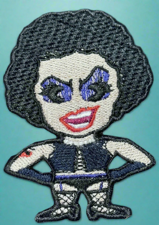 This is an iron-on patch of frank-n-furter from the Rocky Horror Picture Show. Made in Dunedin, New Zealand by Not Your Nana