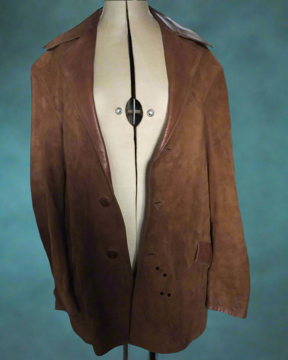 This is a brown suede jacket with brown leather collar and pocket features. Found be Not Your Nana in Dunedin, New Zealand