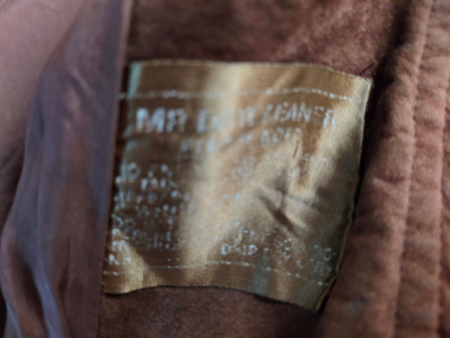 Suede bomber jacket by Austin Brown