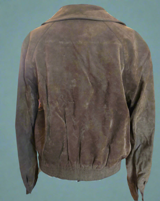 Brown leather jacket on a mannequin against a teal background