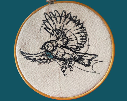 Bird in flight embroidery