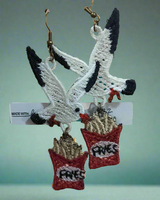 Chip eating seagull earrings
