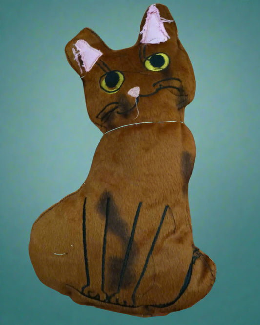 Cat-shaped toy on a tiled floor