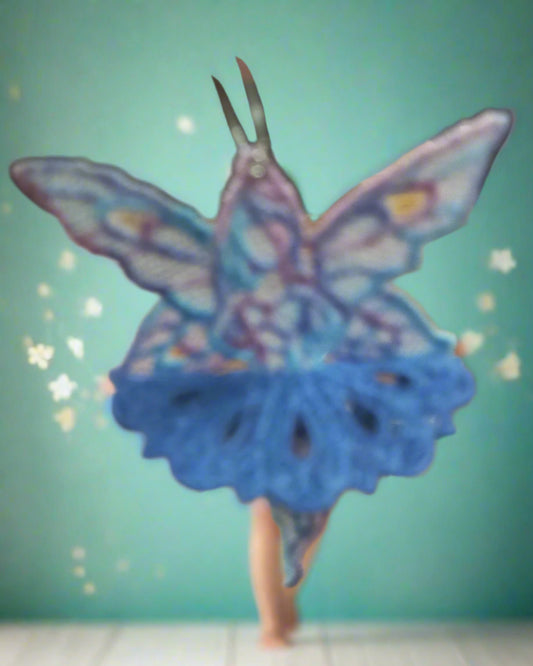 This is a multi coloured lace fairy made by Not Your Nana in Dunedin, New Zealand