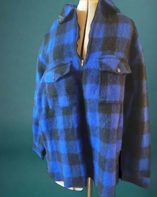 this is a black and blue  plaid woollen bush shirt. Found in DUnedin, New Zealand by Not Your Nana