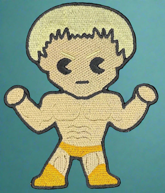 This is an iron-on patch of Rocky  from the Rocky Horror Picture Show. Made in Dunedin, New Zealand by Not Your Nana