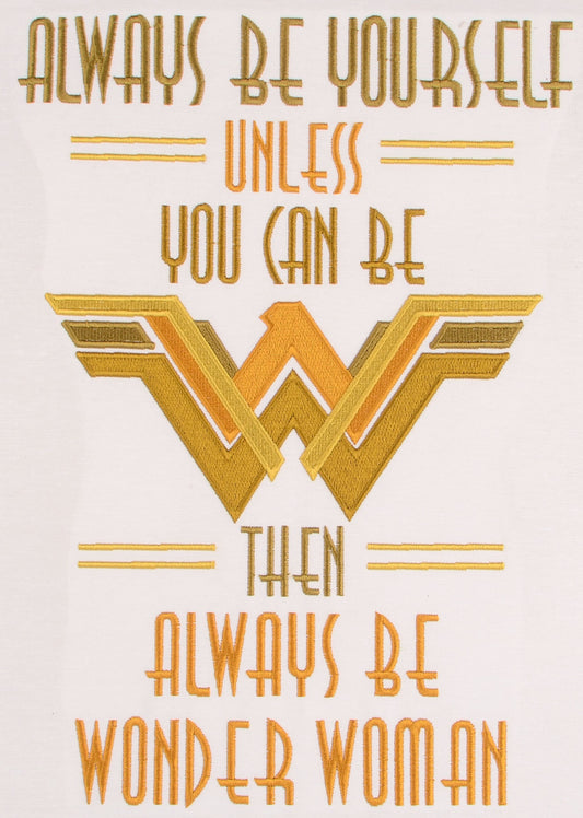 this is a Wonder woman lwall hanging  with logo and inspirational message. Made by Not Your Nana